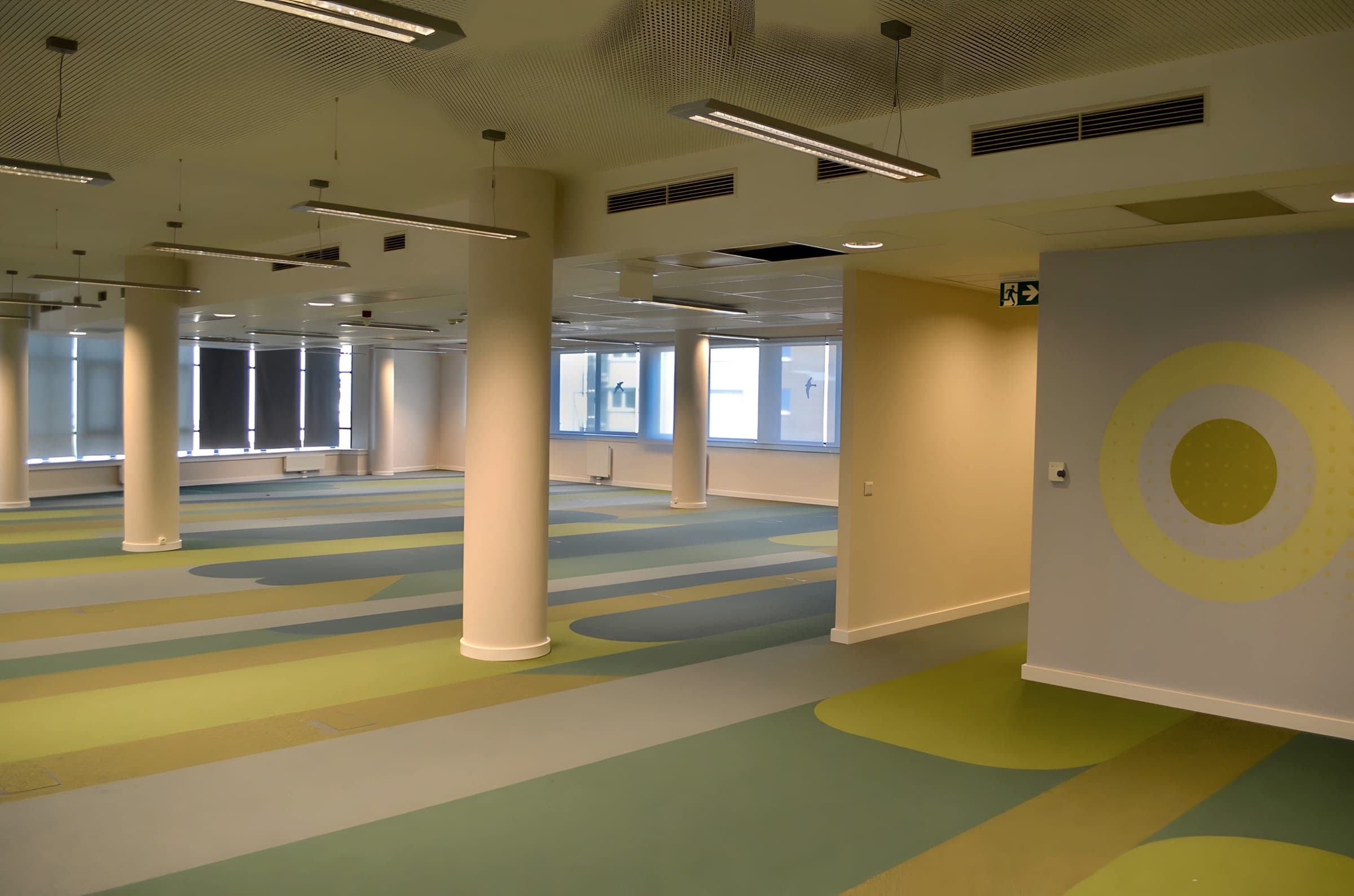 Empty open-plan office floor with daylight